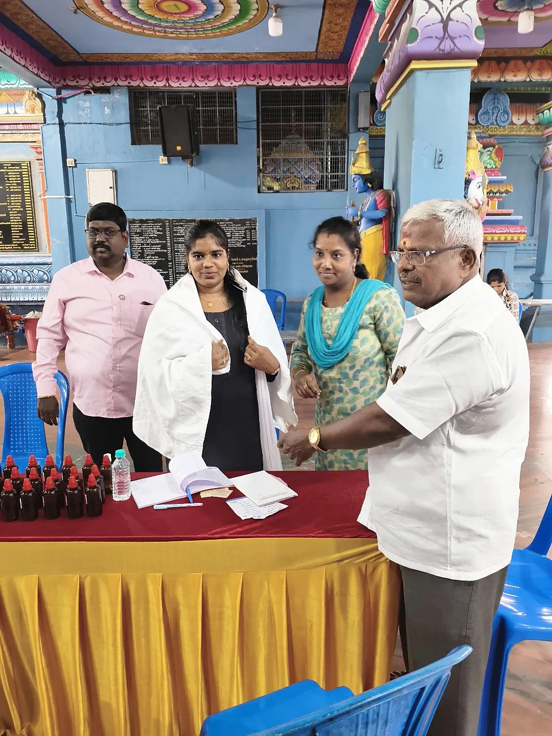Dr. Inbavalli with organisers at a free medical camp